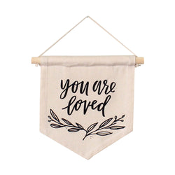 you are loved hang sign